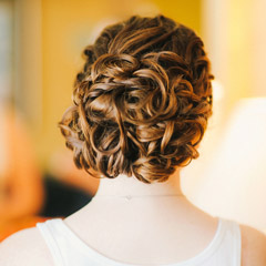 picture of a romantic wedding updo with curls